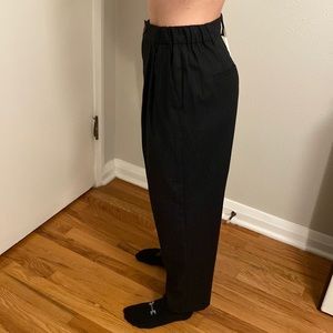 Women’s black pinstripe suit pants.
